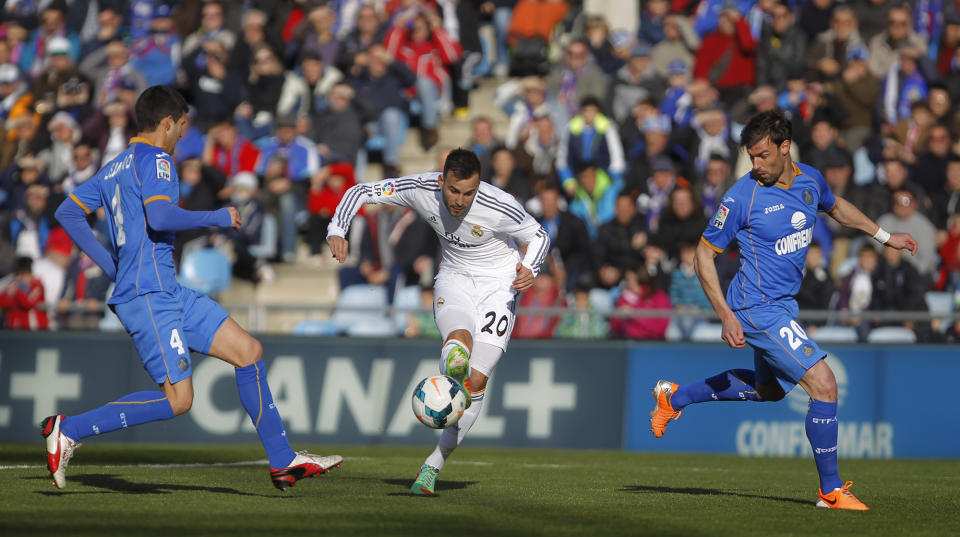 Real's Jese Rodriguez scores his goal during a Spanish La Liga soccer match between Real Madrid and Getafe at the Coliseum Alfonso Perez stadium in Madrid, Spain, Sunday, Feb. 16, 2014. (AP Photo/Gabriel Pecot)