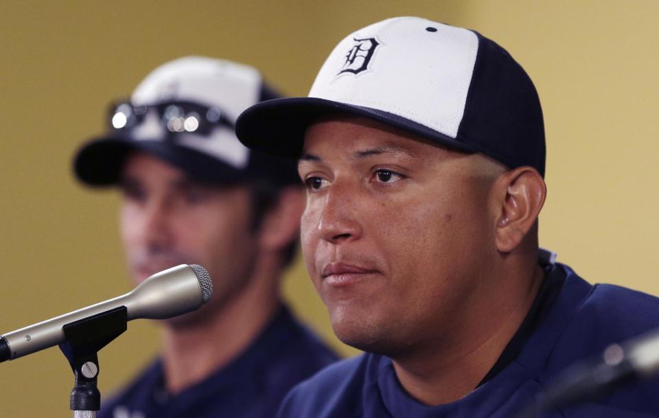 Detroit Tigers first baseman Miguel Cabrera is seen during a news conference where the details of Cabrera's eight-year contract extension was officially announced in Lakeland, Fla., Friday, March 28, 2014. (AP Photo/Carlos Osorio)