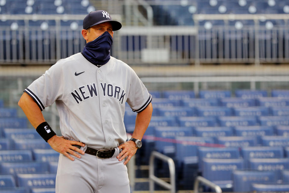 WASHINGTON, DC - JULY 23:  Manager Aaron Boone #17 of the New York Yankees looks on during the national anthem prior to the game between the New York Yankees and the Washington Nationals at Nationals Park on Thursday, July 23, 2020 in Washington, District of Columbia. (Photo by Alex Trautwig/MLB Photos via Getty Images)