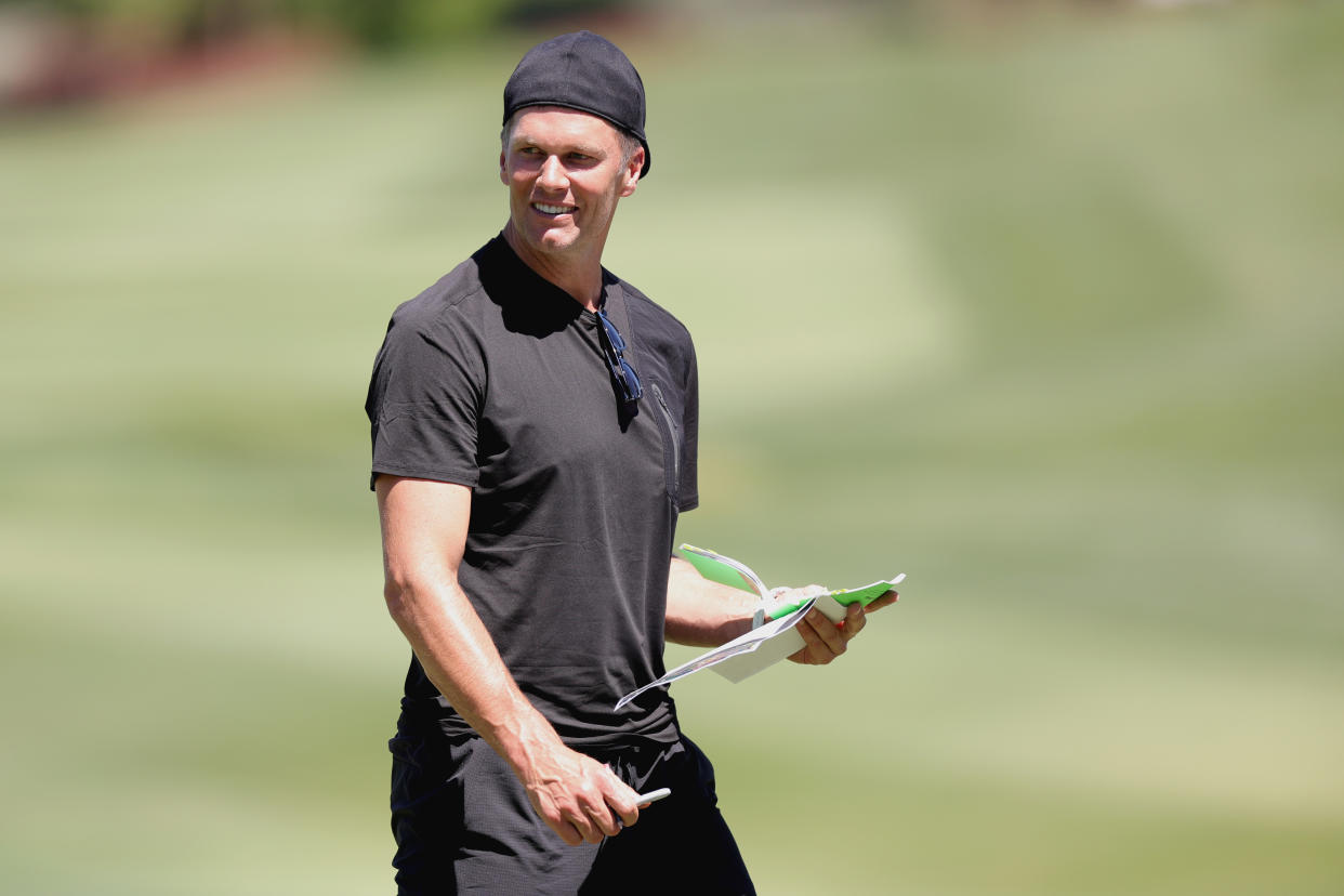 LAS VEGAS, NEVADA - MAY 31: Tom Brady makes notes around the green during a practice round at Wynn Golf Club on May 31, 2022 in Las Vegas, Nevada. (Photo by Carmen Mandato/Getty Images for the Match)