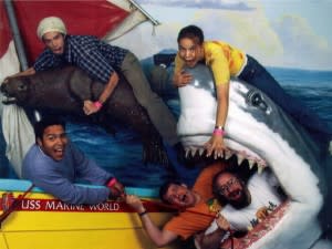 People being eaten by a fake shark