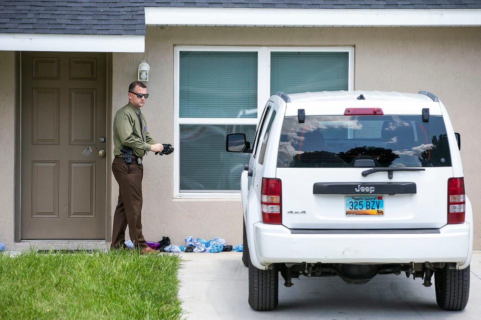 A detective at the crime scene on Sept. 11, 2019.