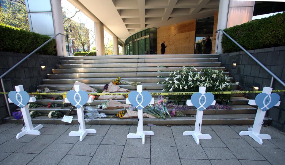 The scene outside the Old National Bank is one of remembrance for five people killed Monday. April 11, 2023  