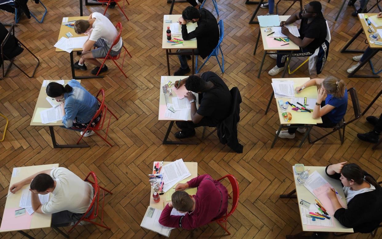 AQA has admitted that for three years, some of its GCSE and A-level papers were “remarked” by the same examiner. - AFP