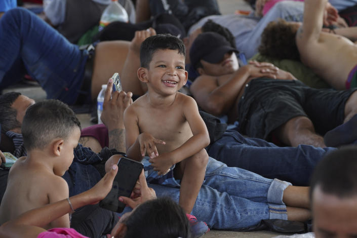 A caravan of migrants, mostly from Central America, heading north, stop to rest in the Alvaro Obregon community, Tapachula municipality, Chiapas state, Mexico, Saturday, Oct. 23, 2021. (AP Photo/Marco Ugarte)