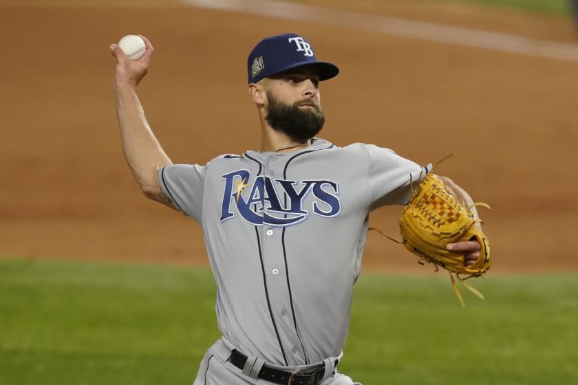 Tampa Bay Rays relief pitcher Nick Anderson throws against the Los Angeles Dodgers during the fifth inning in Game 2 of the baseball World Series Wednesday, Oct. 21, 2020, in Arlington, Texas. (AP Photo/Tony Gutierrez)