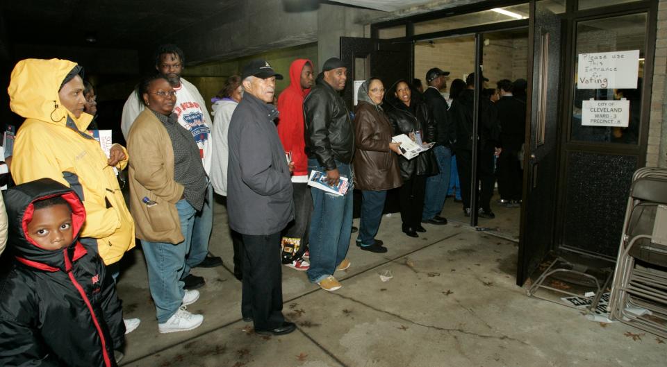 A long line of voters queued up outside a Cleveland elementary school during the 2004 presidential election.