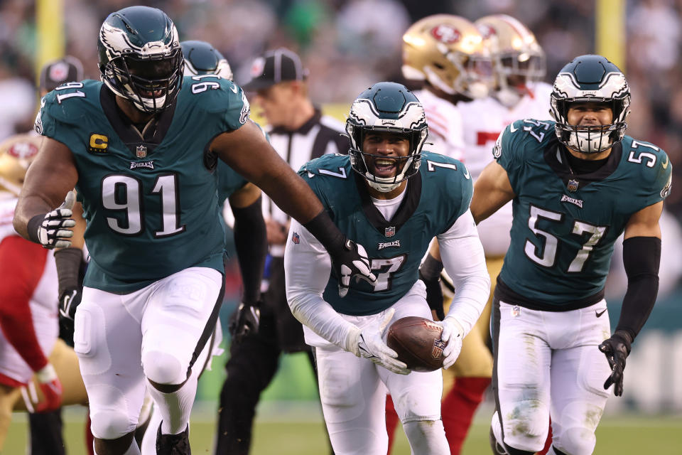 Haason Reddick (7) of the Philadelphia Eagles celebrates with Fletcher Cox (91) and T.J. Edwards (57) after recovering a fumble against the San Francisco 49ers. (Photo by Tim Nwachukwu/Getty Images)