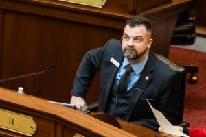 Senator Chris Trakel, R-Caldwell, sits on Senate floor. 