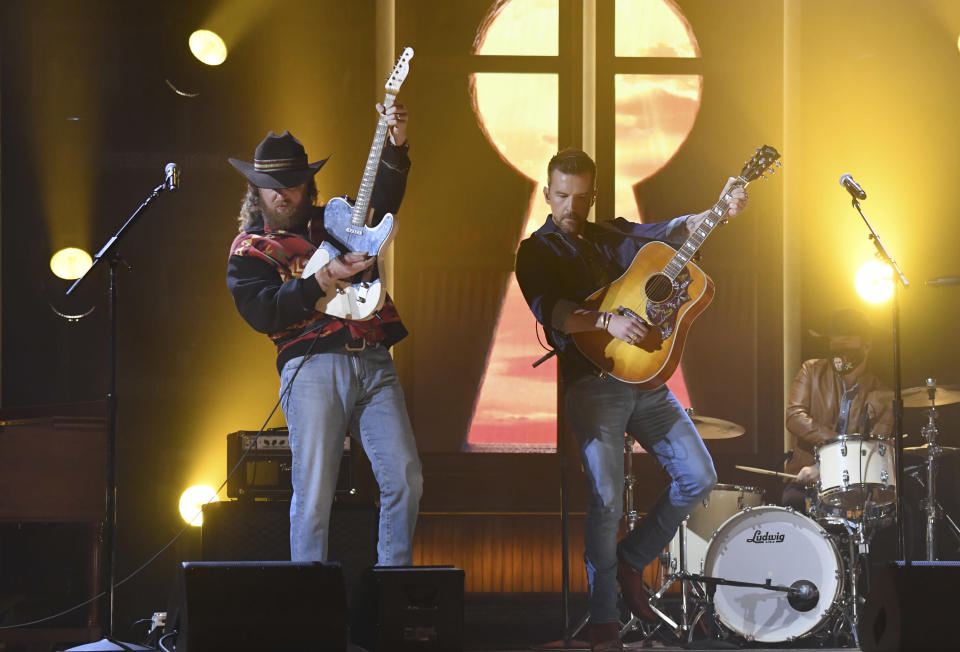 John Osborne, left, and T.J. Osborne, of Brothers Osborne, perform at the 56th annual Academy of Country Music Awards on Sunday, April 18, 2021, at the Ryman Auditorium in Nashville, Tenn. (Photo by Amy Harris/Invision/AP)