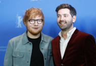 Director, screenwriter, editor and producer Murray Cummings and Ed Sheeran pose during a photocall to promote the movie Songwriter at the 68th Berlinale International Film Festival in Berlin, Germany, February 23, 2018. REUTERS/Fabrizio Bensch