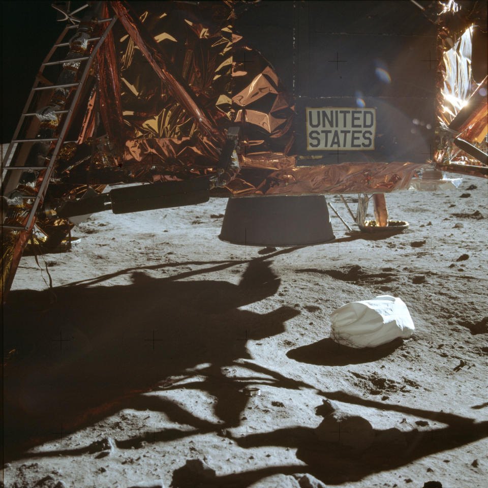 This July 20, 1969 photo made available by NASA shows the Lunar Module descent stage and area of soil beneath. In landing on the moon, the astronauts were traveling horizontally for a while, so the thrusters weren’t pointed down and wouldn’t have kicked up any dust, astronomer Emily Drabek-Maunder at the Royal Observatory Greenwich in London says. But when the module finally did touch down, “you can see dust actually being thrown up.” As for the lack of a crater, Roger Launius, NASA’s former chief historian, said the astronauts didn’t need to use a large blast to slow themselves down, because the moon’s gravity is roughly one-sixth that of Earth’s. “It was more of a gentle landing,” he said. (NASA via AP)