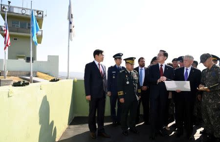U.S. Defense Secretary Jim Mattis and South Korean Defense Minister Song Young-moo visit an observation post near the truce village of Panmunjom, South Korea October 27, 2017. Yonhap/via REUTERS