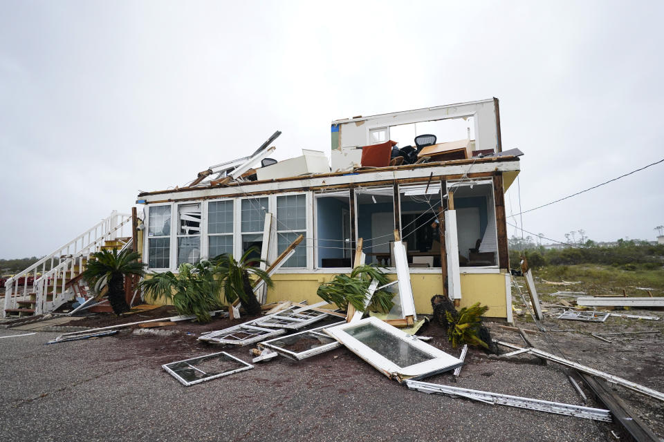 The business of Joe and Teresa Mirable is seen after Hurricane Sally moved through the area, Wednesday, Sept. 16, 2020, in Perdido Key, Fla. Hurricane Sally made landfall Wednesday near Gulf Shores, Alabama, as a Category 2 storm, pushing a surge of ocean water onto the coast and dumping torrential rain that forecasters said would cause dangerous flooding from the Florida Panhandle to Mississippi and well inland in the days ahead. (AP Photo/Gerald Herbert)