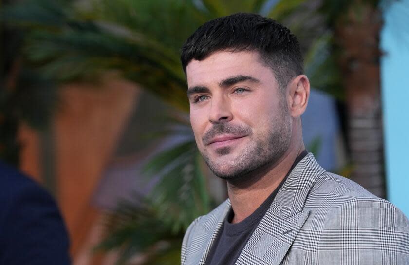 Zac Efron poses at the premiere of the Netflix film "A Family Affair" at the Egyptian Theatre, Thursday, July 13, 2024, in Los Angeles. (AP Photo/Chris Pizzello)