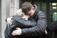 File photo dated 20/12/19 of Harry Dunn's mother Charlotte Charles (centre) and stepfather Bruce Charles (left) outside the Ministry Of Justice in London after meeting with the Director of Public Prosecutions. Harry Dunn's mother, Charlotte Charles, has marked the anniversary of her son's death by saying his name is "forever written into history" � and vowed to carry on his family's fight for justice.