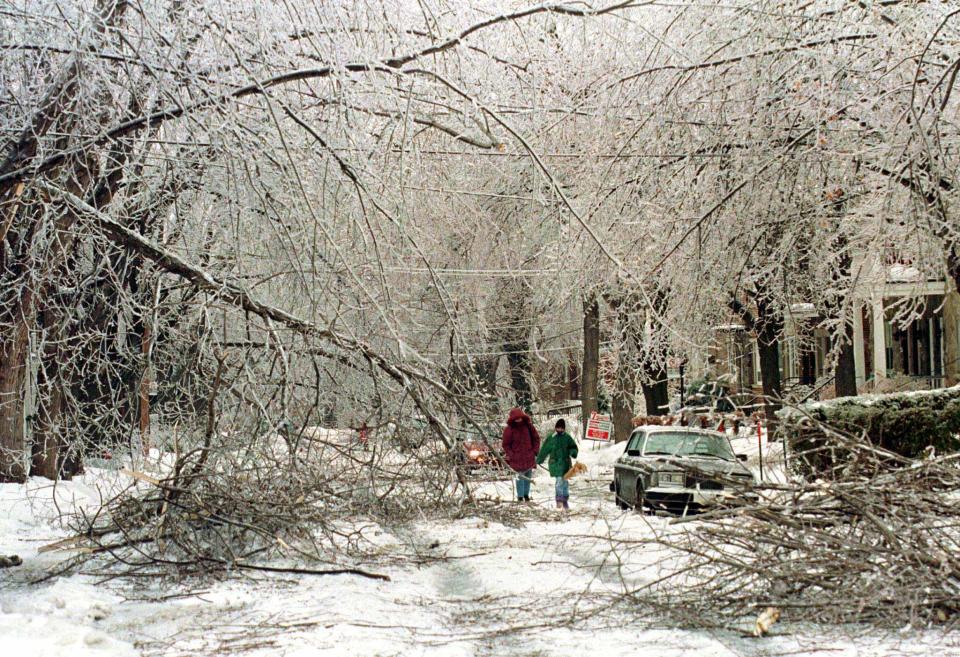 A street in Montreal's west-end is littered with fallen trees and power lines January 7 after being hammered by one of the province's worst-ever ice storms earlier this week. Over two-thousand hydro workers are clearing power lines trying to restore power to the 500,000 Quebec households and business that are still in the dark. More rain and freezing rain is predicted for the region for remainder of the week.

CANADA WEATHER