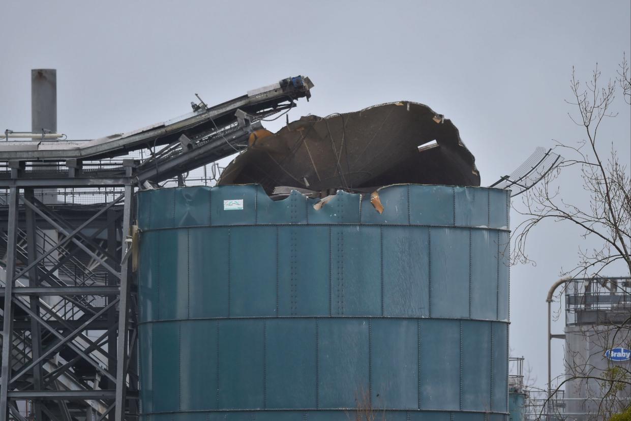 The scene in Avomouth, Bristol, as fire crews, police and paramedics responded to the large explosion  (PA)