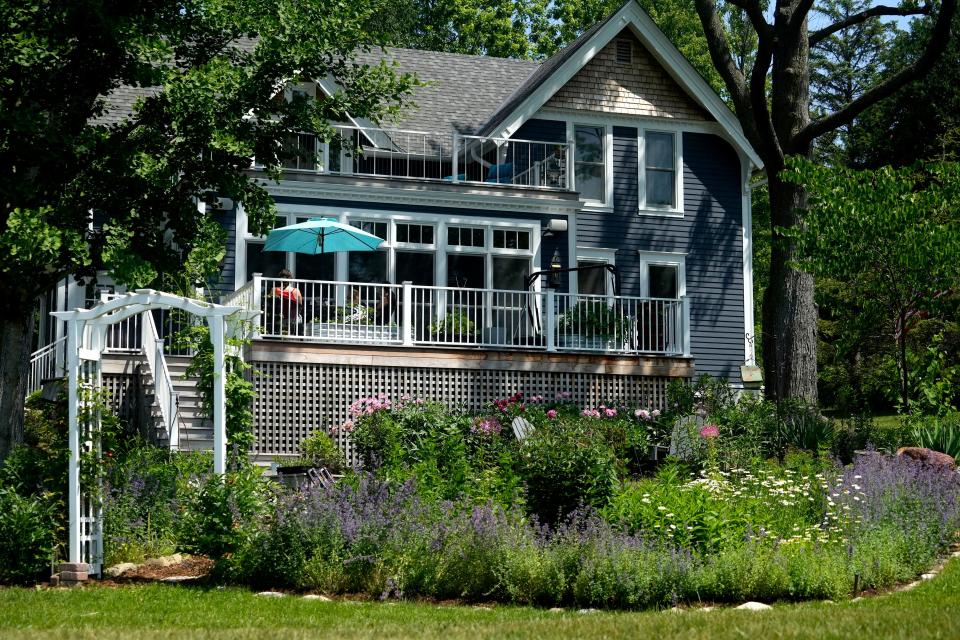 The home of Tom and Susan Felmer is surrounded by lush gardens on nearly all sides, as seen on June 22, 2023 in Cedarburg.