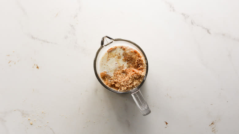 chocolate hazelnut mixture in measuring cup