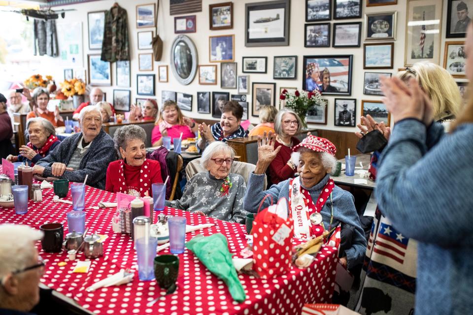 Clara Doutly, an original Rosie the Riveter, smiles as friends and fellow Rosies sing the Happy Birthday song for her to celebrate her 101st birthday at Bomber Restaurant in Ypsilanti on Thursday Oct. 20, 2022.