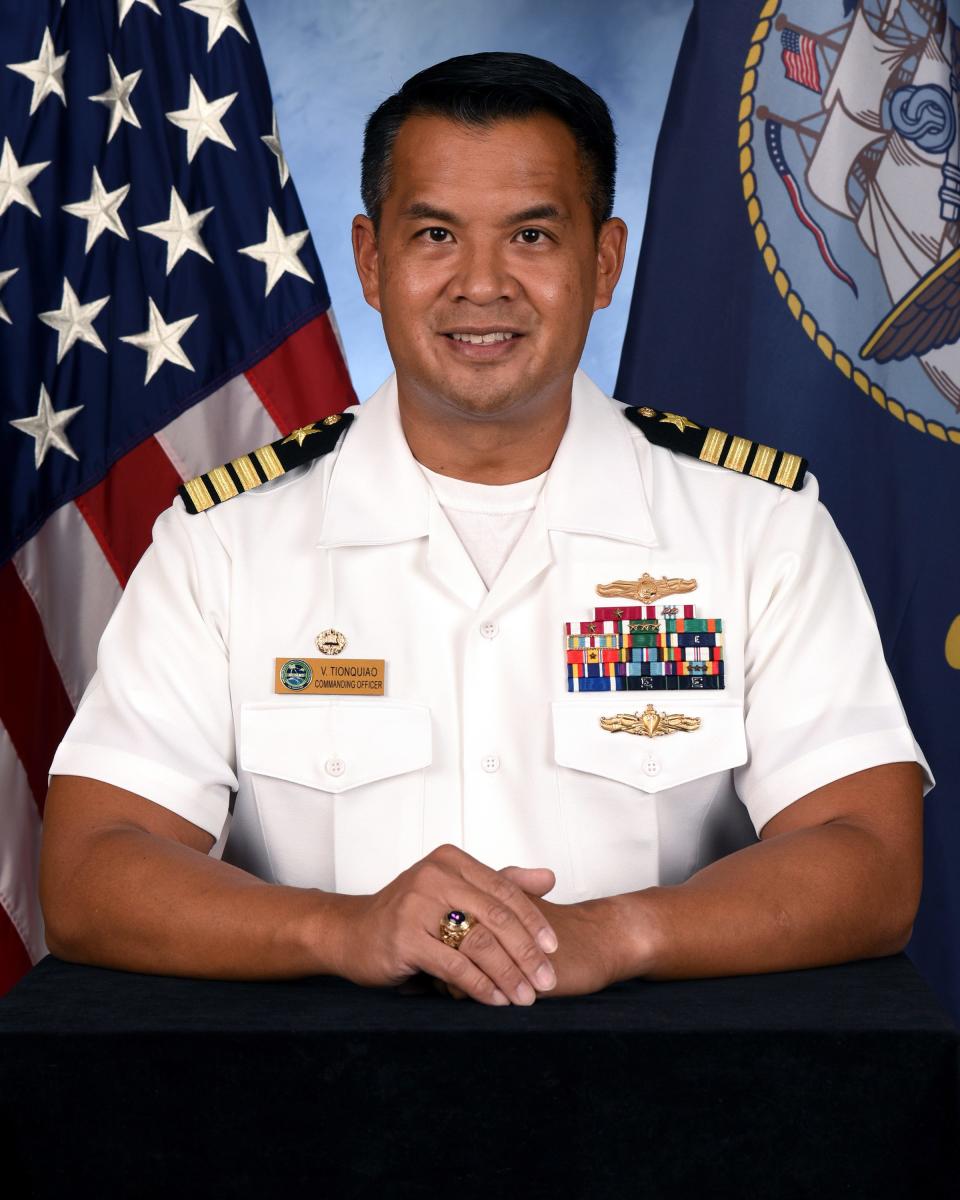 An official portrait of Capt. Vincent S. Tionquiao, the commanding officer of Naval Computer and Telecommunication Area Master Station (NCTAMS) Pacific in Sept. 21, 2020.