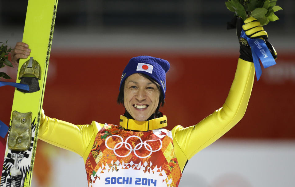 Japan's Noriaki Kasai celebrates winning the silver after the ski jumping large hill final at the 2014 Winter Olympics, Saturday, Feb. 15, 2014, in Krasnaya Polyana, Russia. (AP Photo/Gregorio Borgia)