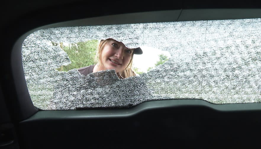 Lisa Walling said softball-size hail smashed through her windshield.
