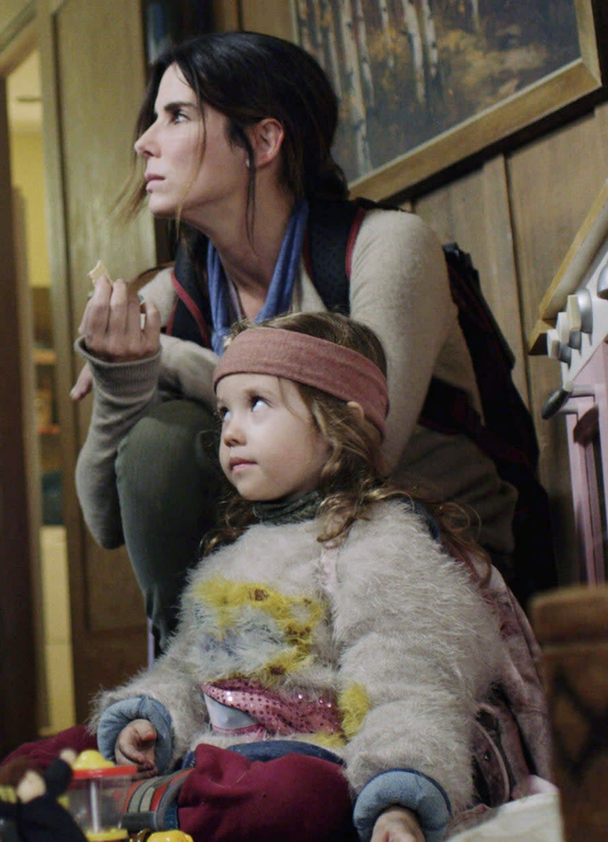 Sandra Bullock and Vivien Lyra Blair in Bird Box