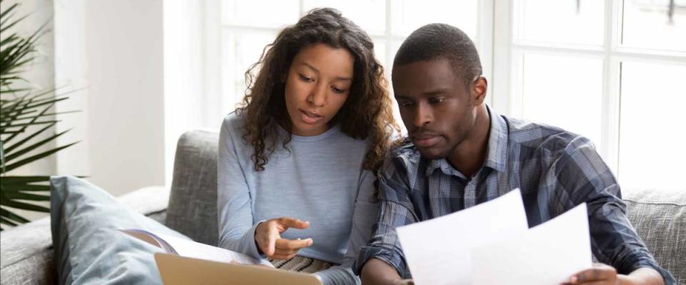 Couple managing their finances.