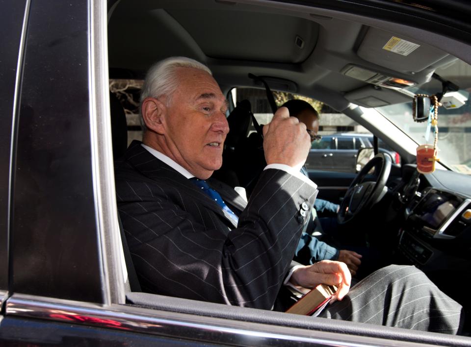 In this Nov. 15, 2019, photo, Roger Stone leaves federal court in Washington. The Justice Department has sued former President Donald Trump's ally Stone, accusing him and his wife of failing to pay nearly $2 million in income tax.