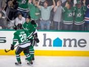 May 1, 2016; Dallas, TX, USA; Dallas Stars center Mattias Janmark (13) and center Cody Eakin (20) celebrate Janmark's goal against the St. Louis Blues during the third period in game two of the first round of the 2016 Stanley Cup Playoffs at the American Airlines Center. Jerome Miron-USA TODAY Sportss