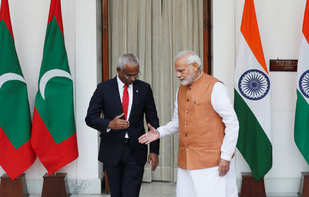 Maldives President Ibrahim Mohamed Solih and India's Prime Minister Narendra Modi shake hands ahead of their meeting at Hyderabad House in New Delhi, December 17, 2018. REUTERS/Adnan Abidi