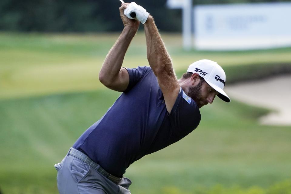 Dustin Johnson hits on the 11th hole during the third round of the Northern Trust golf tournament at TPC Boston, Saturday, Aug. 22, 2020, in Norton, Mass. (AP Photo/Charles Krupa)