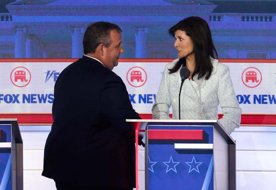 MILWAUKEE, WISCONSIN - AUGUST 23: Republican presidential candidates, former New Jersey Gov. Chris Christie (L) and former U.N. Ambassador Nikki Haley speak during a break in the first debate of the GOP primary season hosted by FOX News at the Fiserv Forum on August 23, 2023 in Milwaukee, Wisconsin. Eight presidential hopefuls squared off in the first Republican debate as former U.S. President Donald Trump, currently facing indictments in four locations, declined to participate in the event. (Photo by Win McNamee/Getty Images)