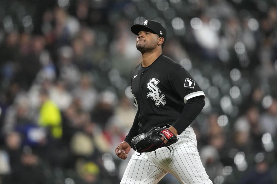 Chicago White Sox relief pitcher Reynaldo Lopez reacts after striking out Cleveland Guardians' Will Brennan with the bases loaded to end the Guardians' half of the seventh inning in a baseball game Wednesday, May 17, 2023, in Chicago. (AP Photo/Charles Rex Arbogast)
