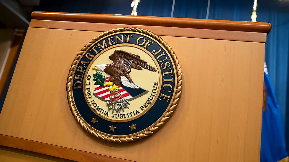 The Department of Justice logo is seen at their headquarters in Washington, D.C., on Thursday, August 5, 2021 prior to a press conference regarding a civil rights matter.