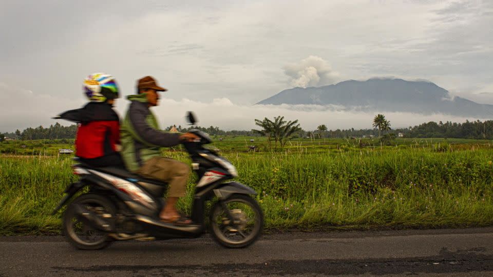 Marapi's volcanic ash seen in the distance from Tanah Datar District in West Sumatra. - Adi Prima/Anadolu/Getty Images