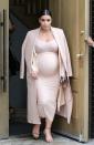 <p>Kim Kardashian's pregnancy wardrobe the second time around was infinitely better than with baby #1. The reality star stuck to bodycon silhouettes in neutral tones — and in finding what worked for her, inspired a wave of other expectant women who followed her lead.</p>