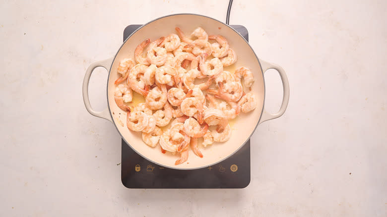 cooking shrimp in skillet