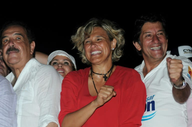 Ecuadorean presidential candidate Cyntia Viteri (centre) celebrates with supporters of her Social Cristiano Madera de Guerrero party during a campaign rally in Guayaquil, on February 16, 2017