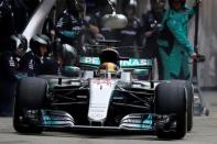 Mercedes' British driver Lewis Hamilton drives his car into the pit lane during the Formula One Chinese Grand Prix in Shanghai April 9, 2017. REUTERS/Andy Wong/Pool