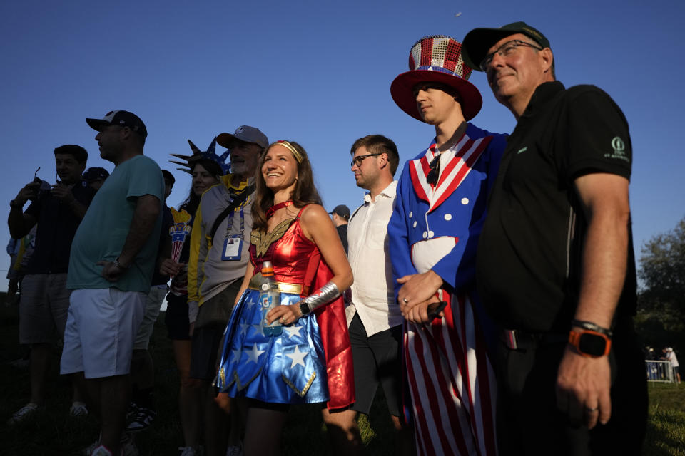 United States fans line the fairway on the 3rd hole during the morning Foursomes matches at the Ryder Cup golf tournament at the Marco Simone Golf Club in Guidonia Montecelio, Italy, Saturday, Sept. 30, 2023. (AP Photo/Alessandra Tarantino)