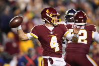 Washington Football Team quarterback Taylor Heinicke (4) throwing the ball during the first half of an NFL football game Seattle Seahawks, Monday, Nov. 29, 2021, in Landover, Md. (AP Photo/Julio Cortez)