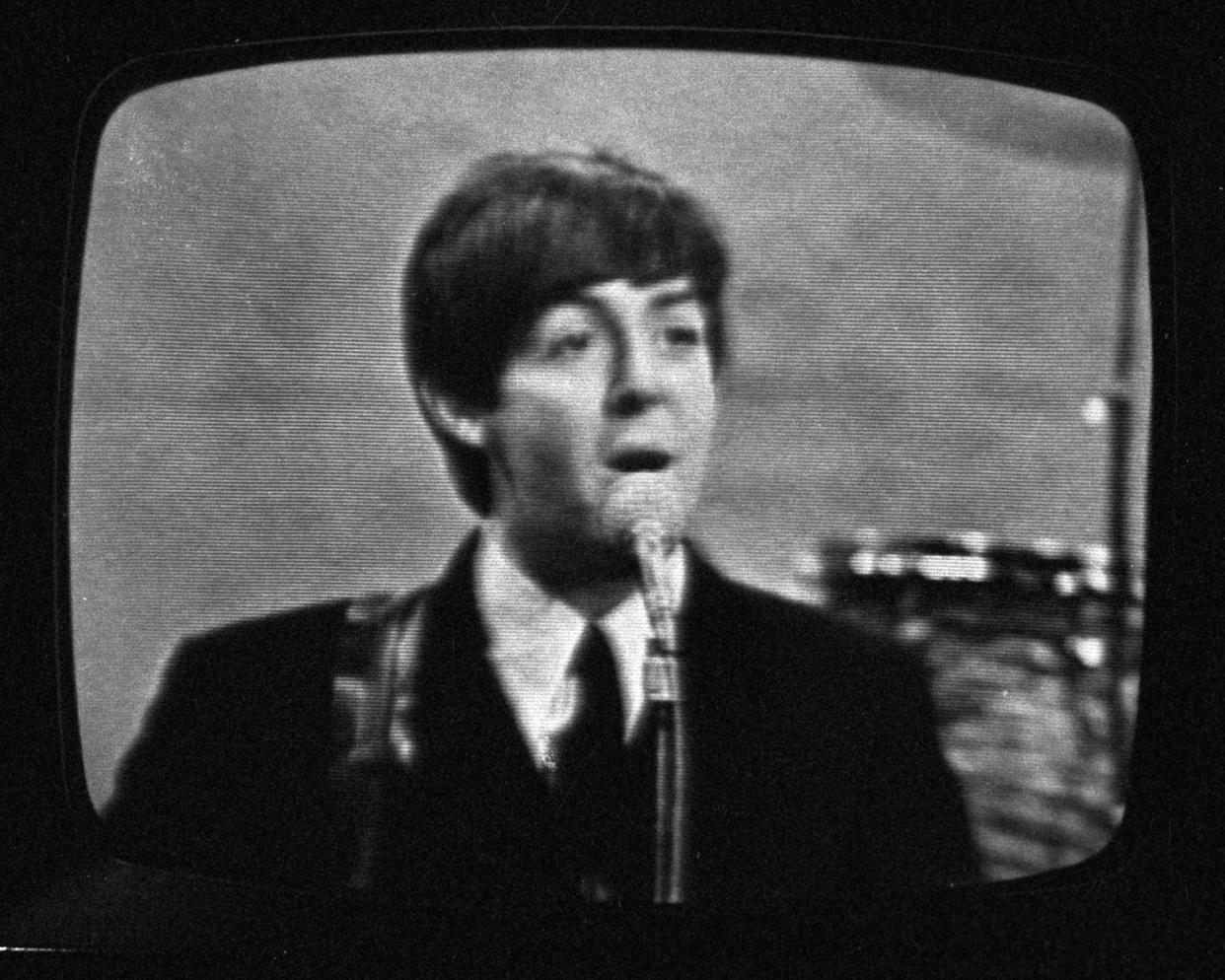 Tom Weschler snapped shots of the Beatles' performances on "The Ed Sullivan Show" in February 1964, including this with Paul McCartney.