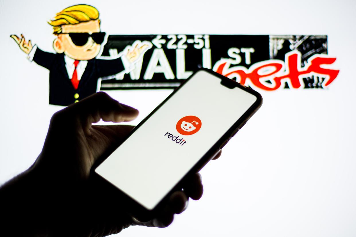 A Reddit logo on a smartphone with the WallStreetBets logo in the background. Photo: Thiago Prudêncio/SOPA Images/LightRocket via Getty Images