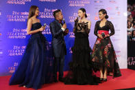 <p>Host Baki Zainal and Farhana M Noor (far right) on the red carpet. Photo: Justine Bantigue </p>