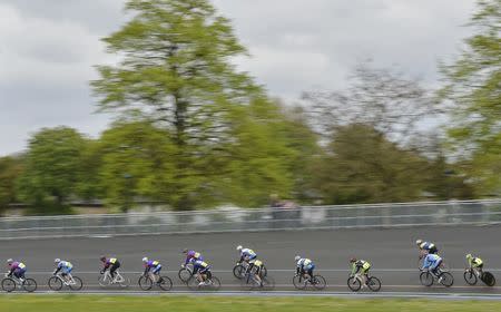 Cyclists compete at an amateur race meet in south London May 5, 2012. REUTERS/Toby Melville