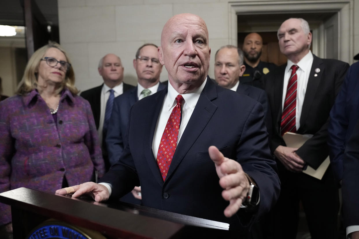 Committee Republican Leader Rep. Kevin Brady, R-Texas, center, speaks to the media after the House Ways & Means Committee takes a vote on whether to publicly release years of former President Donald Trump's tax returns during a hearing on Capitol Hill in Washington, Tuesday, Dec. 20, 2022, as other Republicans look on. (AP Photo/Andrew Harnik)