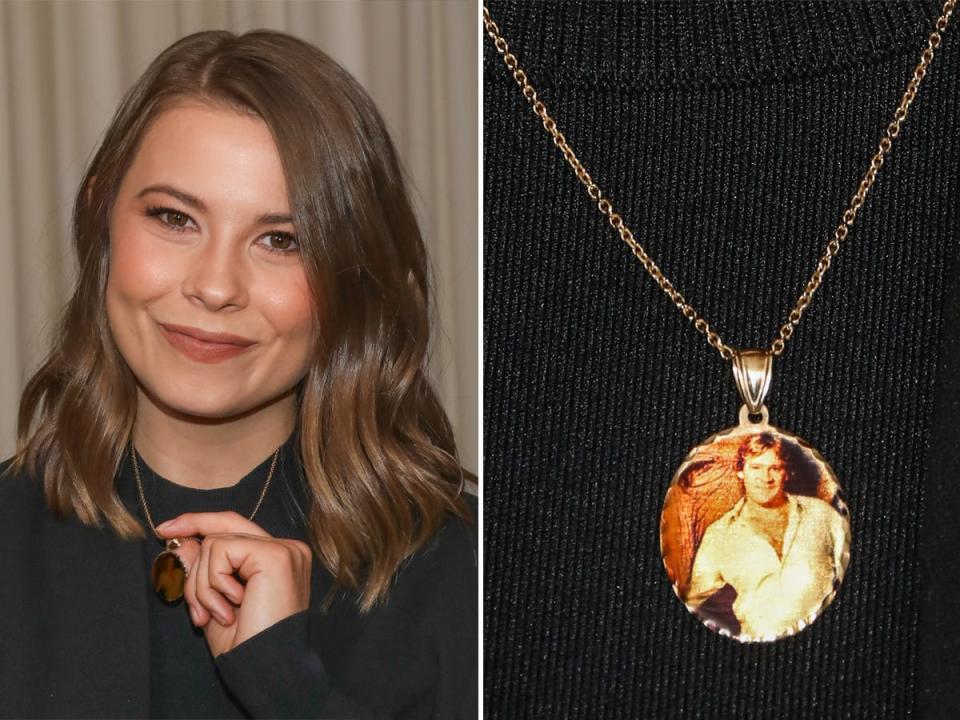 Bindi Irwin wears a necklace featuring a portrait of her father Steve Irwin.
